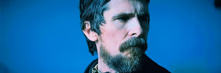 Christian Bale as Augustus Landor, looking moodily to the right.