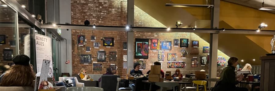 Scene from a table with people in a cafe