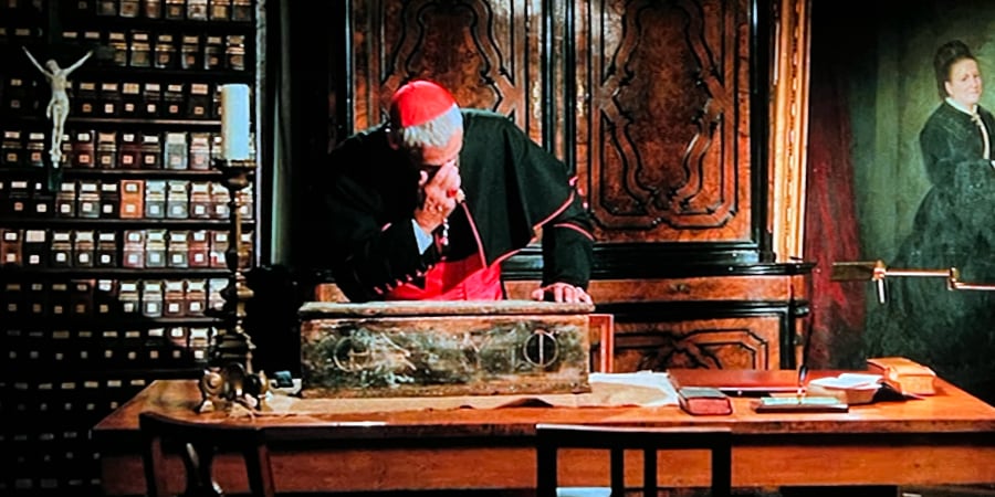 A priest regrets digging up a magical box.